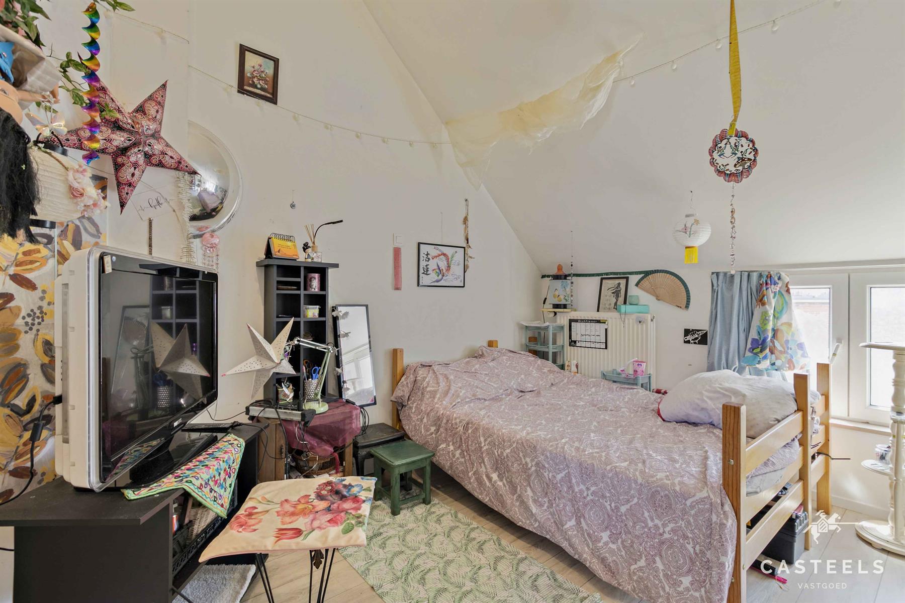 Afbeelding Instapklare gezinswoning met 4 slpks en leuke buitenruimte - Casteels Vastgoed