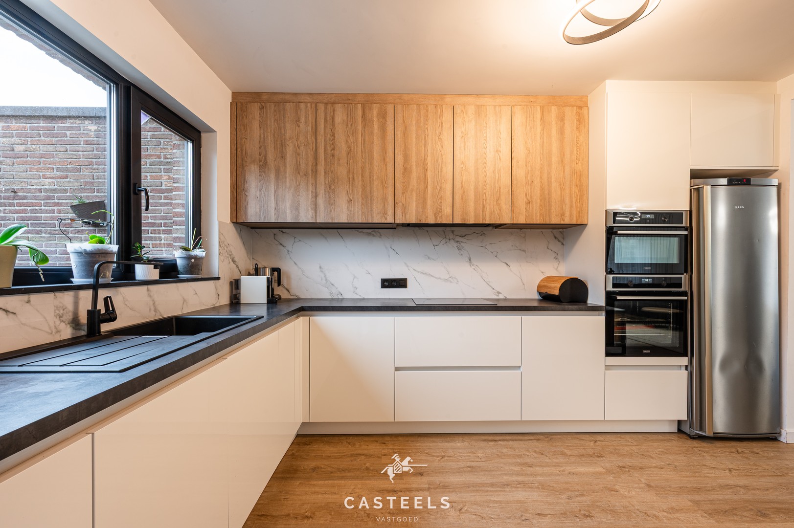 Afbeelding Instapklare halfopen woning te koop in Heusden - Casteels Vastgoed