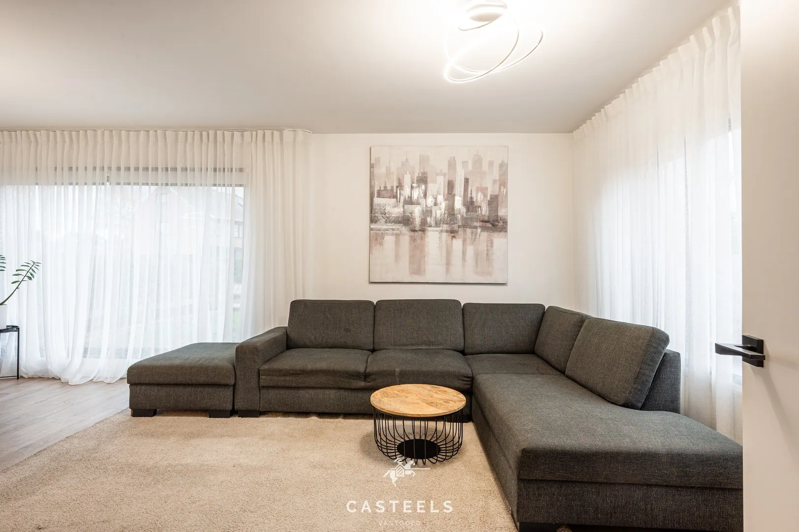 Afbeelding Instapklare halfopen woning te koop in Heusden - Casteels Vastgoed