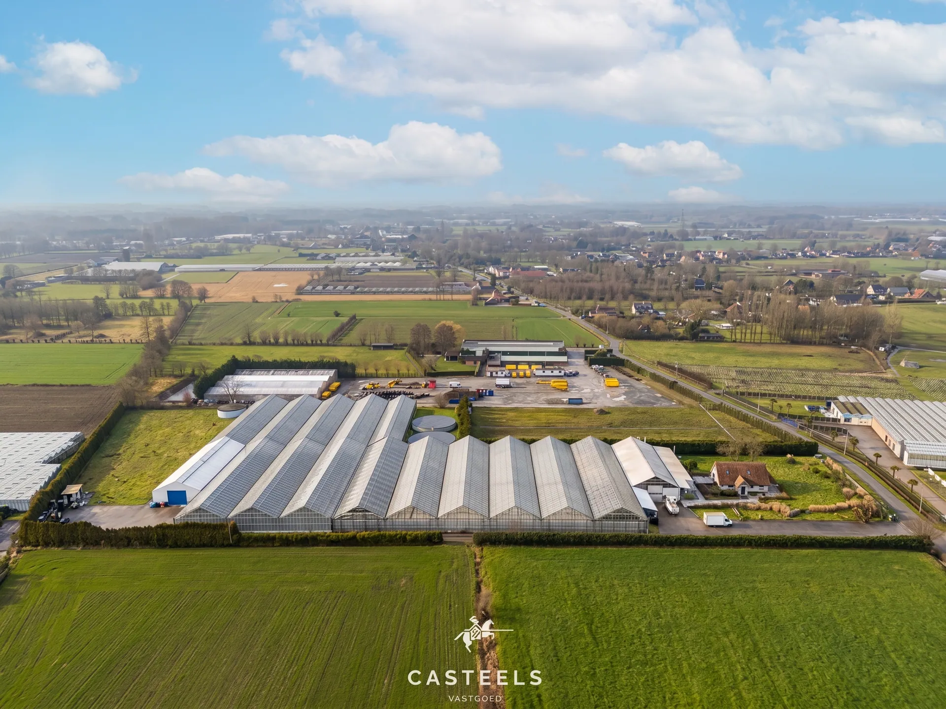 Afbeelding Professionele tuinbouwsite van 1,98 ha met 9.400 m² serres nabij E17 / R4 - Casteels Vastgoed