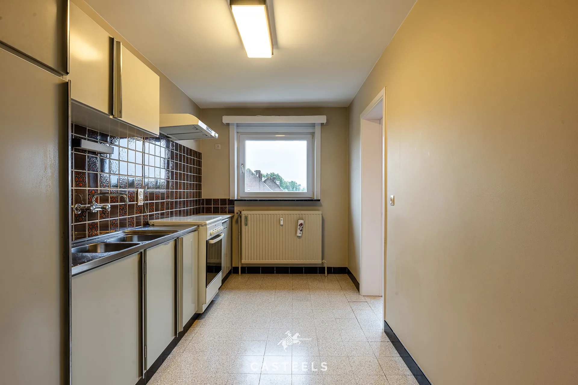 Afbeelding Ruim, te renoveren EPC B appartement met twee slpkmrs te Gent - Casteels Vastgoed