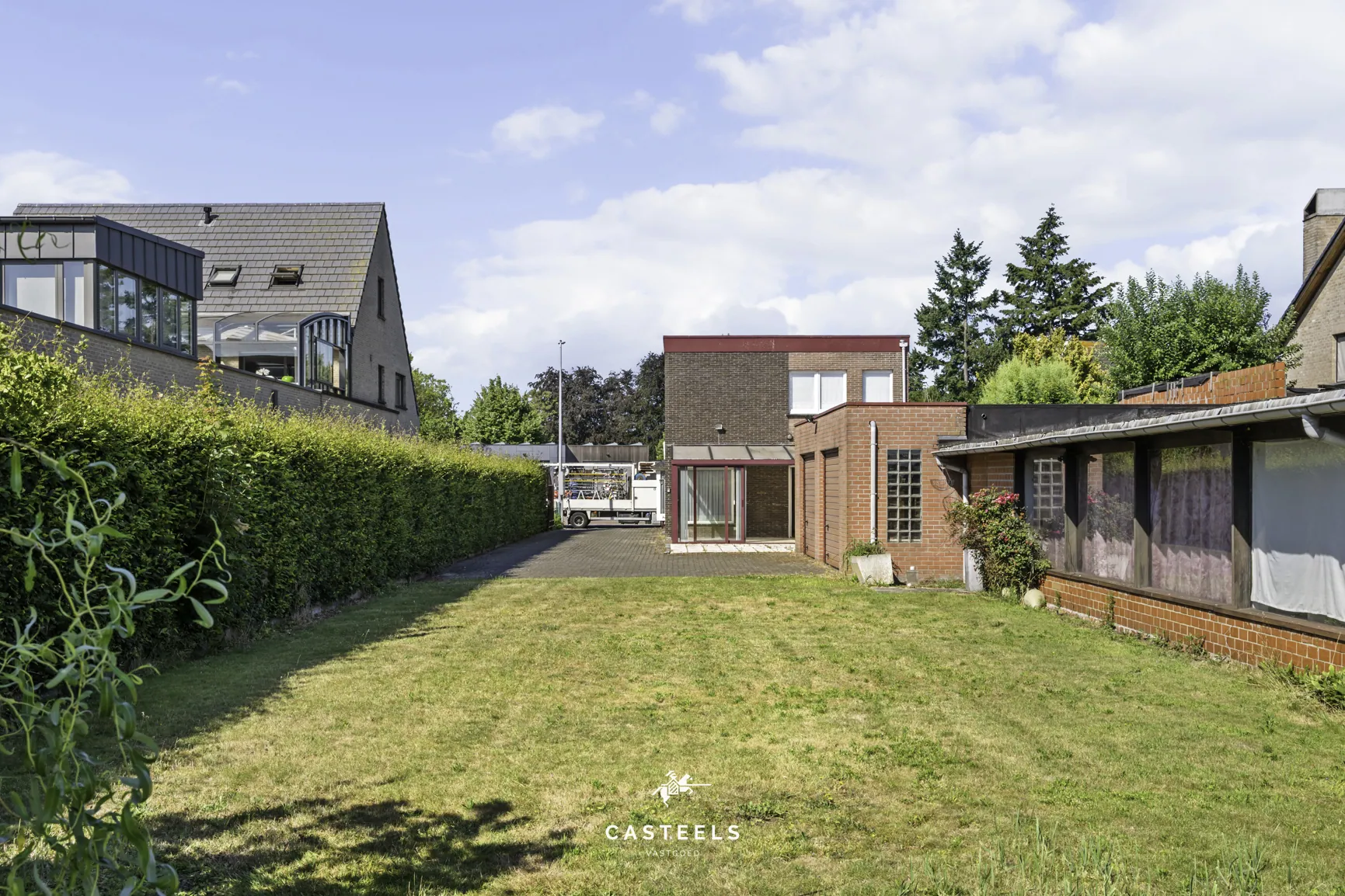 Afbeelding Woning met ruim werkatelier op 1.009 m² in centrum Lochristi - Casteels Vastgoed
