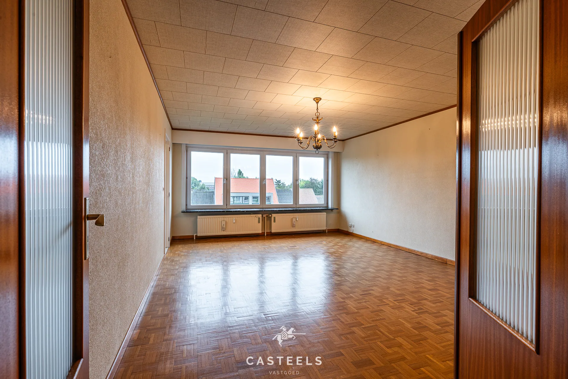 Afbeelding Ruim, te renoveren EPC B appartement met twee slpkmrs te Gent - Casteels Vastgoed