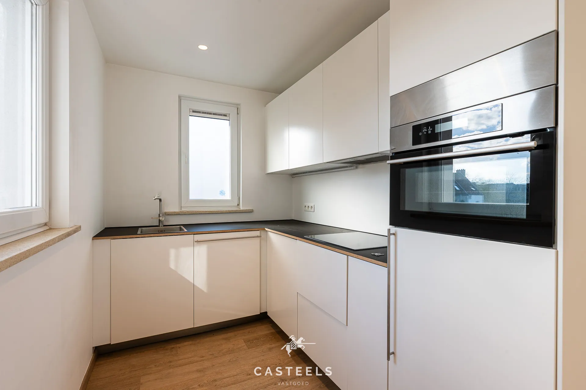Afbeelding Opbrengsteigendom: 2 app. (EPC B) + garage/magazijn - Casteels Vastgoed