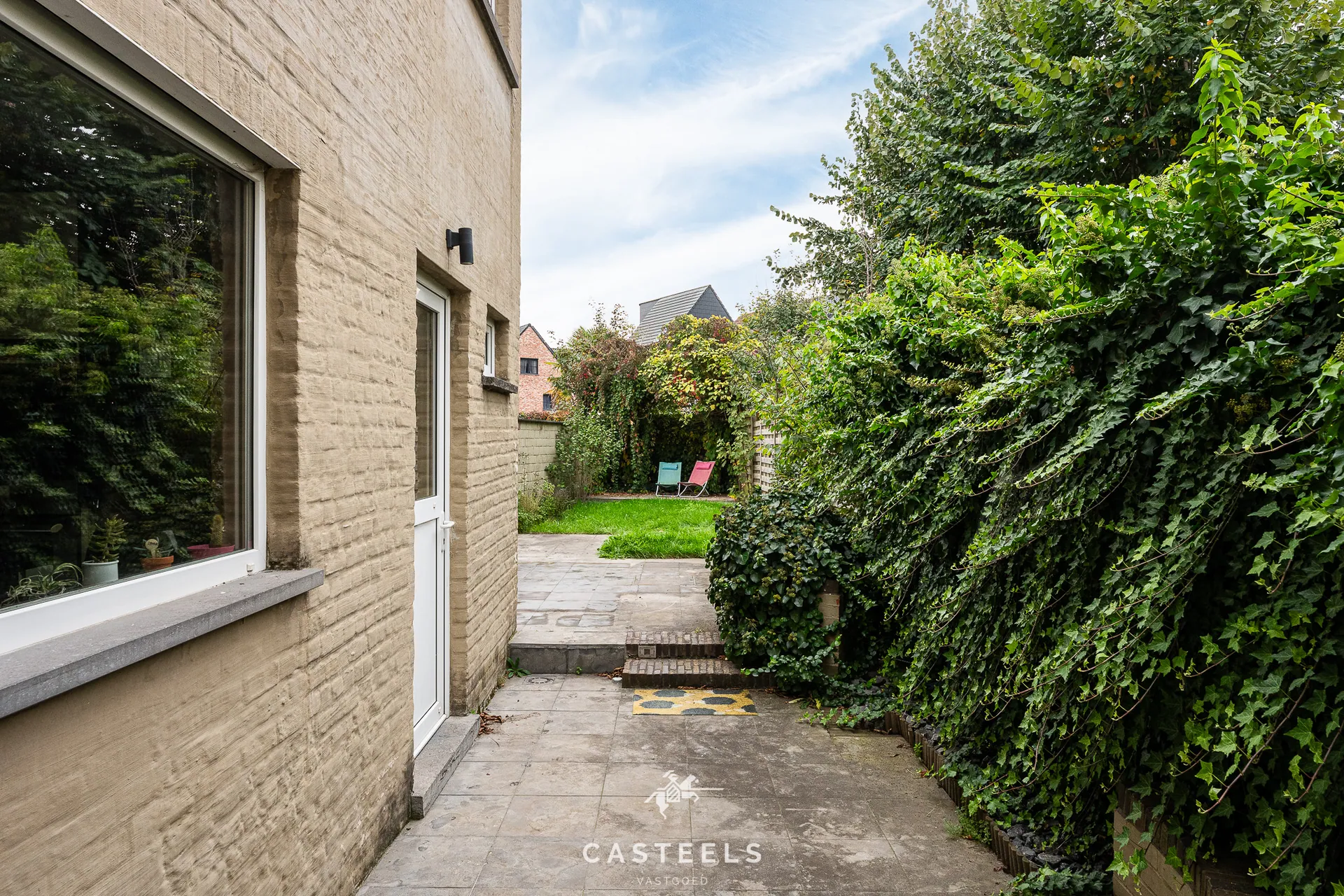 Afbeelding Centraal gelegen rijwoning met tuin in Sint-Denijs-Westrem - Casteels Vastgoed