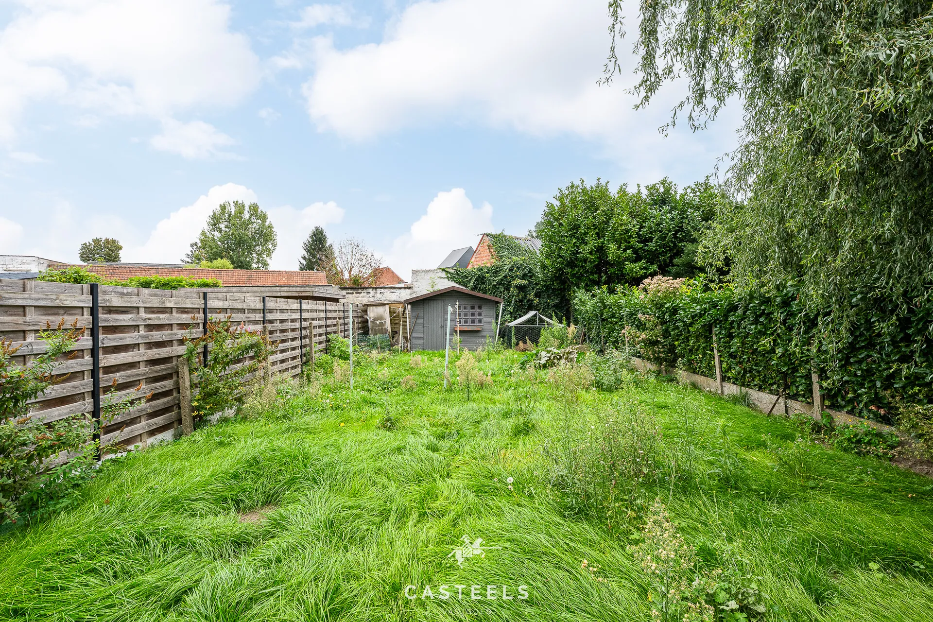 Afbeelding Te renoveren woning met ruime tuin in Merelbeke Flora - Casteels Vastgoed