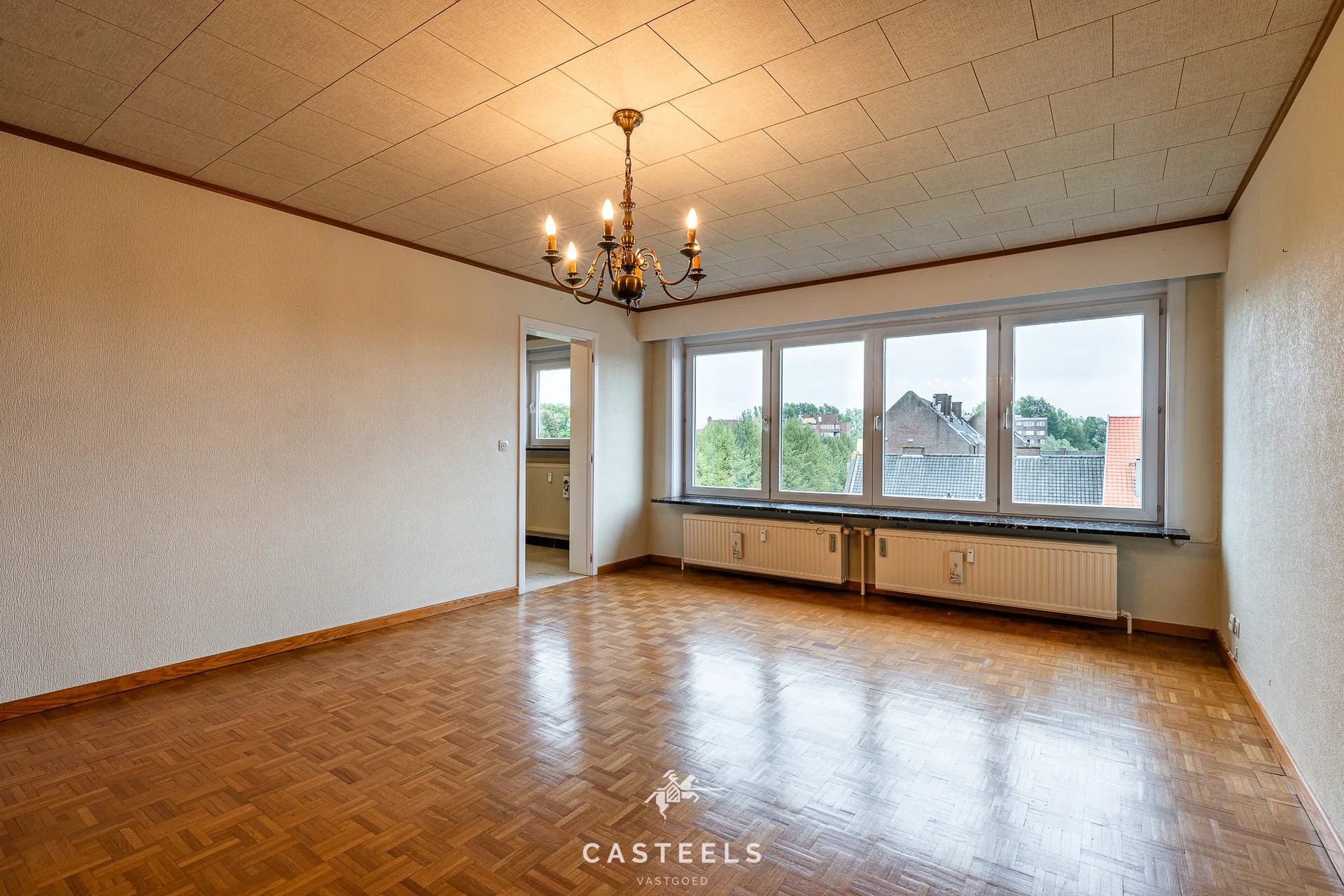 Afbeelding Ruim, te renoveren EPC B appartement met twee slpkmrs te Gent - Casteels Vastgoed